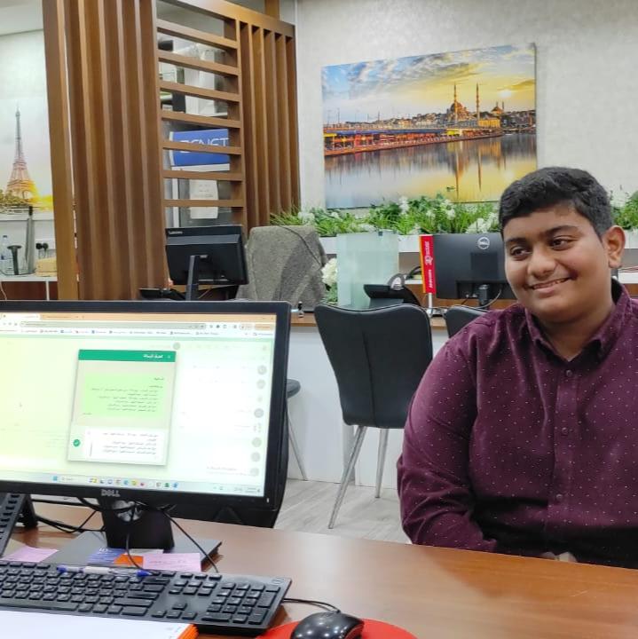 Teen learning through hands-on experience during an onsite visit to a travel agency – The Garden of Knowledge